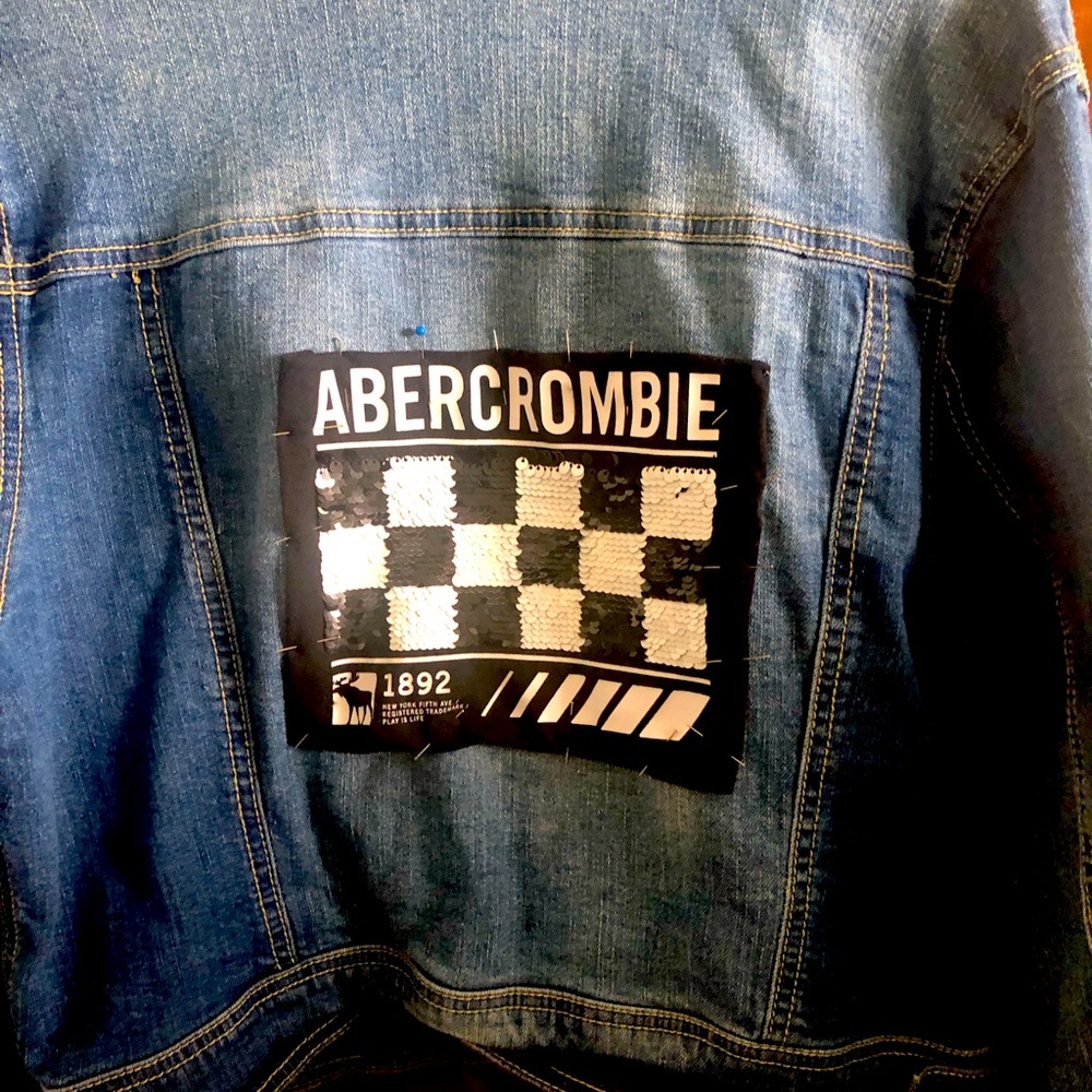 Denim jacket, one of a kind embellished on the back